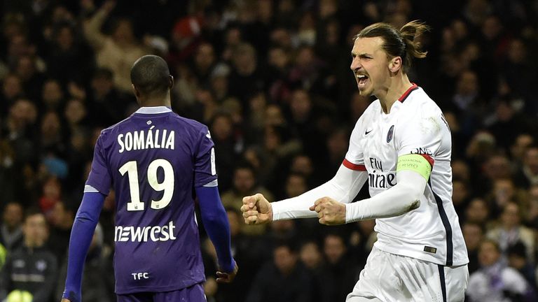 Paris Saint-Germain forward Zlatan Ibrahimovic (R) celebrates after scoring a goal against Toulouse