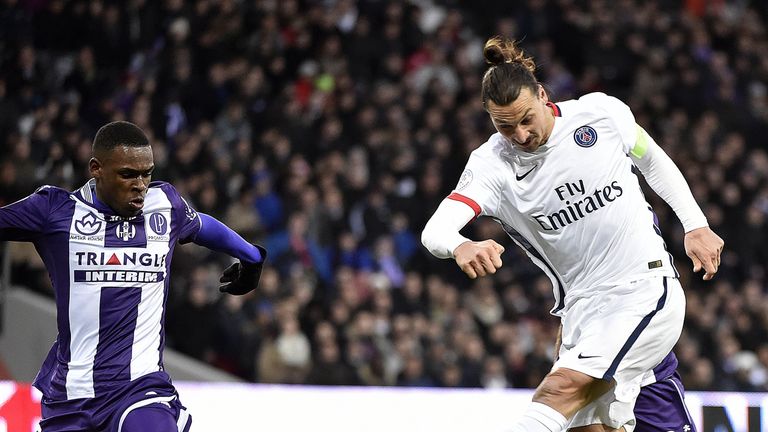Paris Saint-Germain forward Zlatan Ibrahimovic (R) scores against Toulous