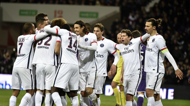 Paris Saint-Germain forward Zlatan Ibrahimovic (R) celebrates with team-mates  after scoring against Toulouse
