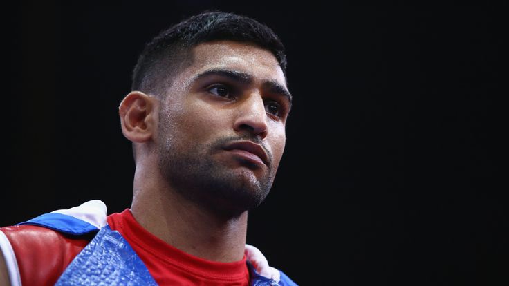 Amir Khan is stepping up to face middleweight champion Alvarez