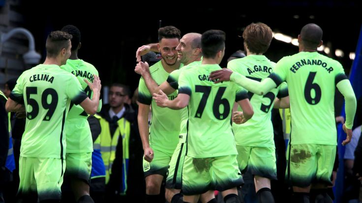 David Faupala celebrates Man City's first-half equaliser at Stamford Bridge