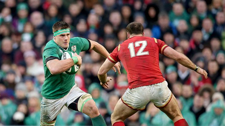Ireland flanker CJ Stander takes on Wales centre Jamie Roberts during the Six Nations draw in Dublin