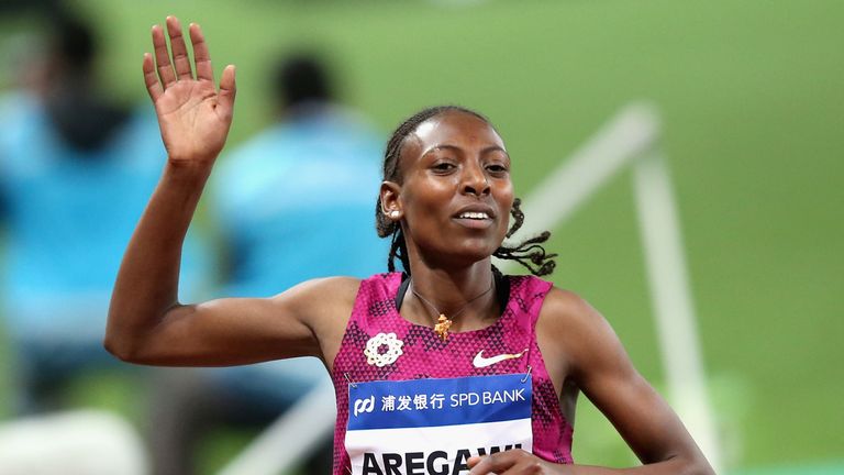 Abeba Aregawi of Sweden celebrates after crossing the finishing line during the Women 1,500m of the Diamond League Track and Field
