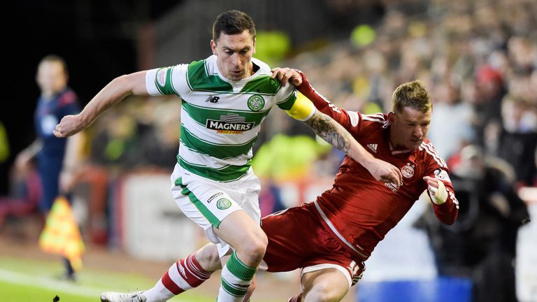 Celtic captain Scott Brown battles with Jonny Hayes