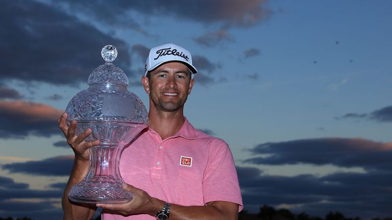 Adam Scott of Australia proudly holds the 2016 Honda Classic trophy 