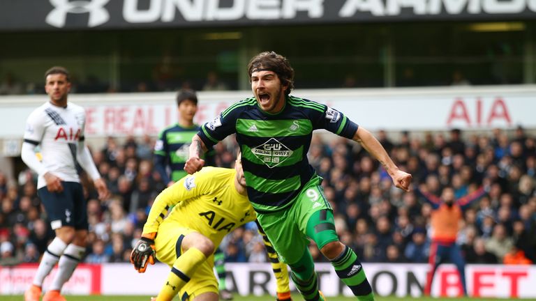 Alberto Paloschi of Swansea City celebrates scoring the opening goal against Tottenham at White Hart Lane