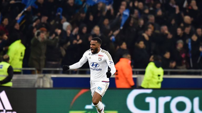 Lyon forward Alexandre Lacazette celebrates his side's win over PSG.
