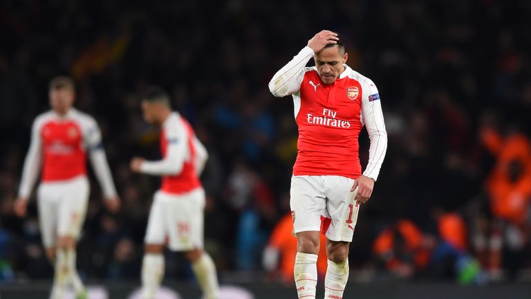A dejected Alexis Sanchez of Arsenal reacts during the UEFA Champions League round of 16, first leg match between Arsenal FC and FC Barcelona 