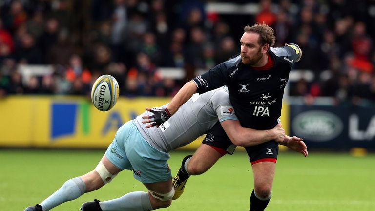 Goode offloads after being tackled by Northampton's James Craig