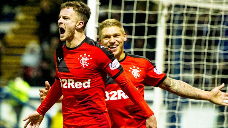 Martyn Waghorn runs to celebrate with Andy Halliday following the Rangers goal