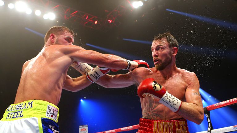 Andy Lee (R) and Billy Joe Saunders fight during their WBO World Middleweight title bout 