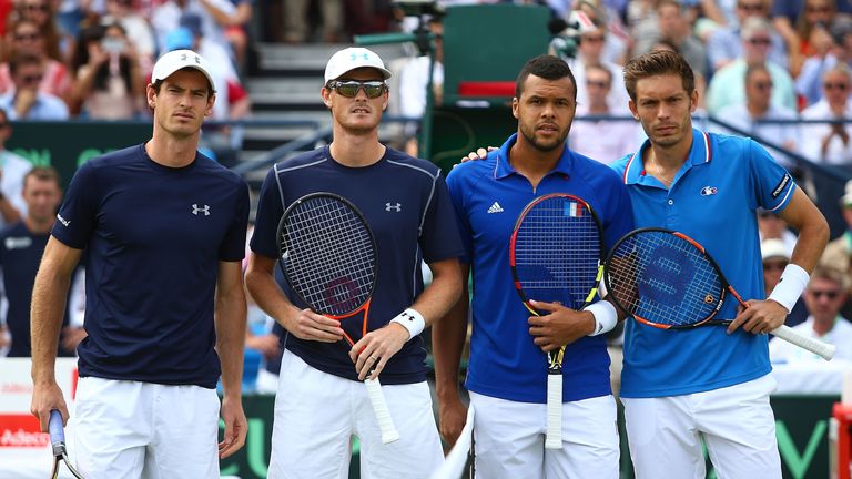Andy Murray and Jamie Murray of Great Britain together with Jo-Wilfried Tsonga and Nicolas Mahut of France pose for photos