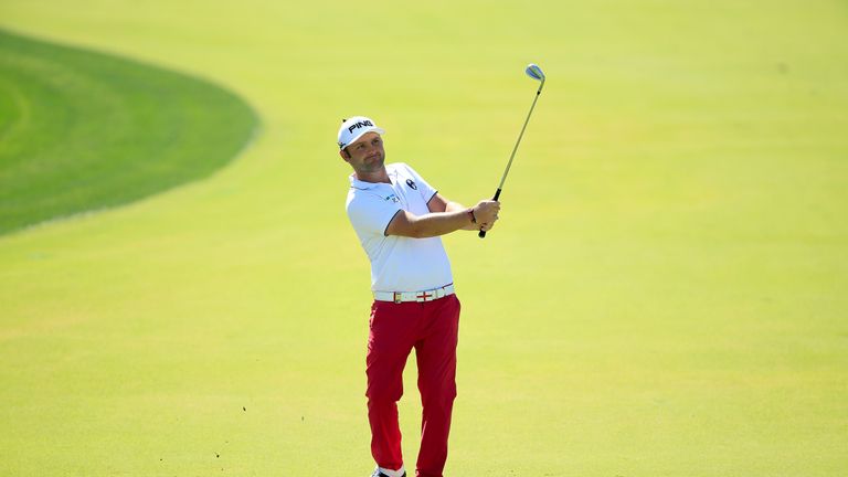 Andy Sullivan of England plays his third shot at the par 4, first hole during the final round of the 2016 Omega Dubai Desert Classic 