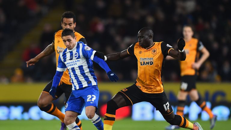 Anthony Knockaert of Brighton battles with Tom Huddlestone and Mo Diame of Hull City during the Sky Bet Championship match