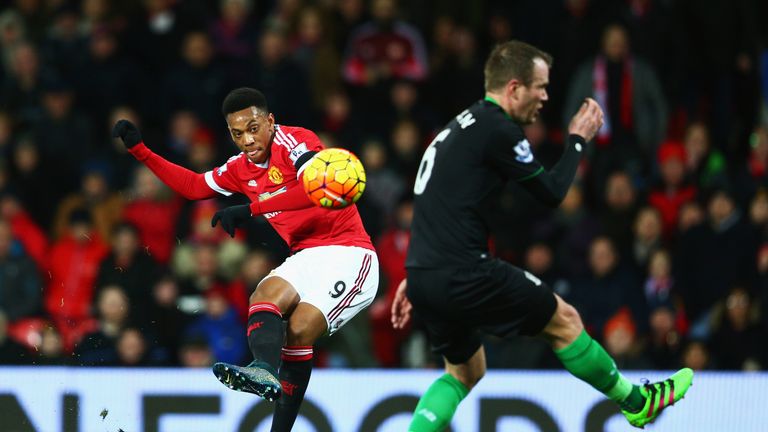 Anthony Martial of Manchester United scores his team's second goal against Stoke