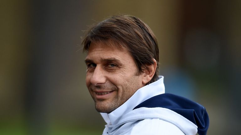 Head coach Antonio Conte smiles prior to the Italy training session at Coverciano on November 15, 2015 in Florence
