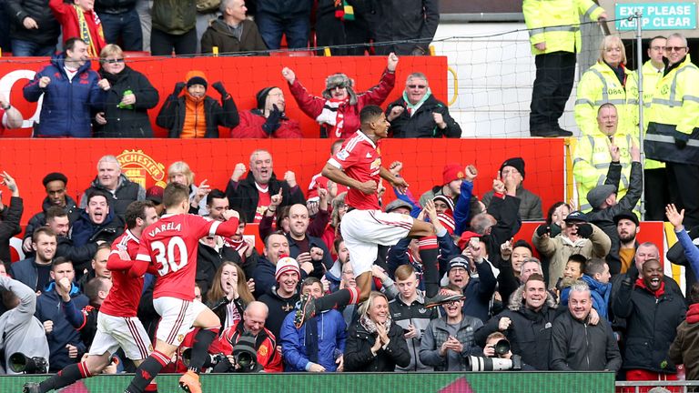 Marcus Rashford celebrates after scoring for Manchester United against Arsenal