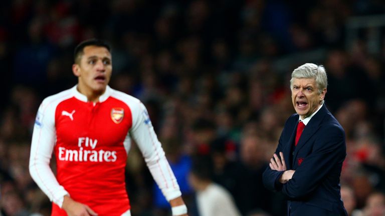 Arsene Wenger, Manager of Arsenal shouts instructions to Alexis Sanchez of Arsenal during the Barclays Premier League match between Arsenal and Chelsea 