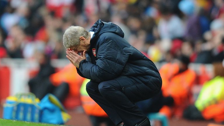 Arsenal manager Arsene Wenger searches for divine intervention. 