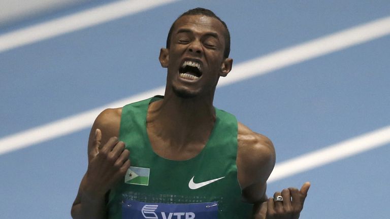 Ayanleh Souleiman (L) celebrates 