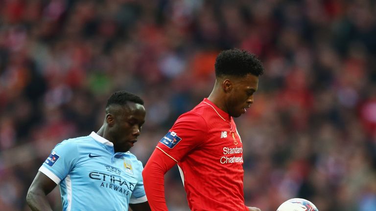 LONDON, ENGLAND - FEBRUARY 28:  Daniel Sturridge of Liverpool shields the ball from Bacary Sagna of Manchester City during the Capital One Cup Final match 