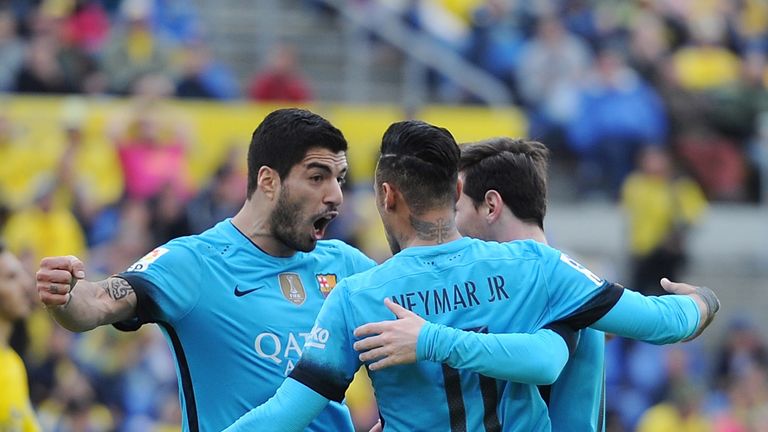 LAS PALMAS, SPAIN - FEBRUARY 20:  Neymar of FC Barcelona celebrates with Lionel Messi and Luis Suarez after scoring his team's 2nd goal during the La Liga 