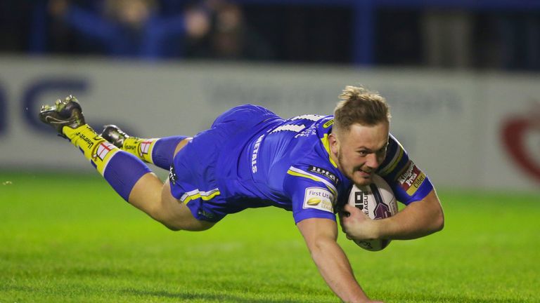Warrington Wolves' Ben Currie scores the first try of the game during the First Utility Super League match at the Halliwell Jones Stadium, Warrington.