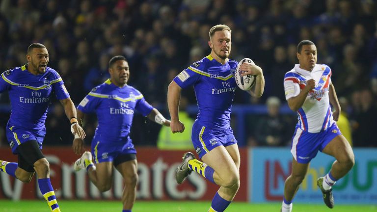 Warrington Wolves¿' Ben Currie runs clear to score the first try of the game during the First Utility Super League match at the Halliwell Jones Stadium, W