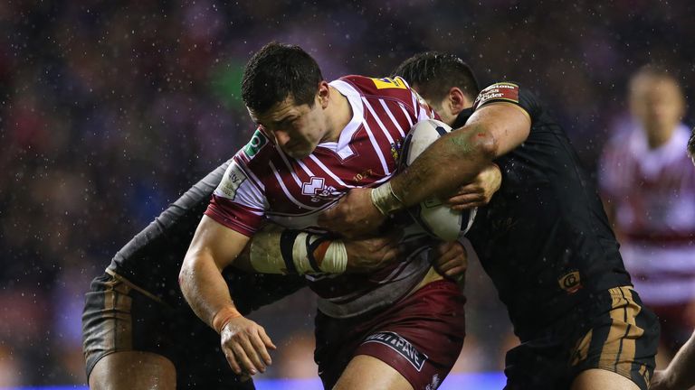 Ben Flower is tackled by Jason Baitieri of Catalans Dragons 