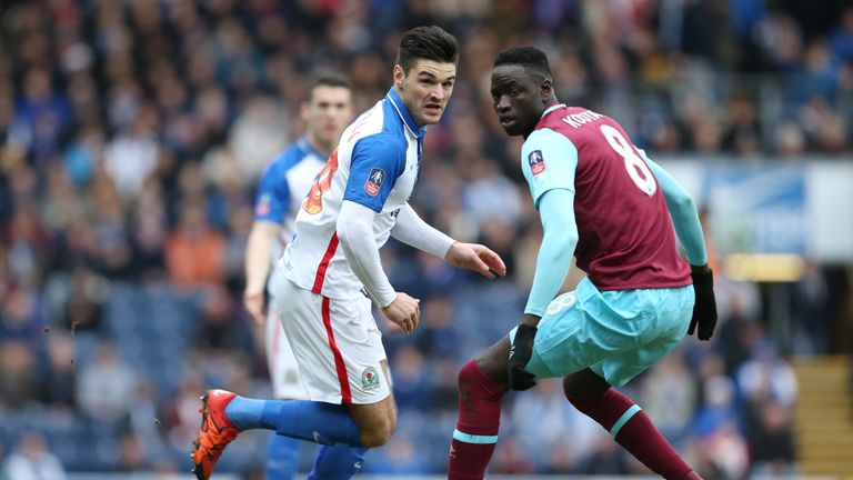 Ben Marshall of Blackburn is challenged by West Ham's Cheikhou Kouyate