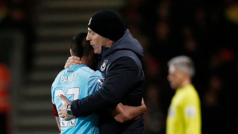 Dimitri Payet is embraced by West Ham manager Slaven 