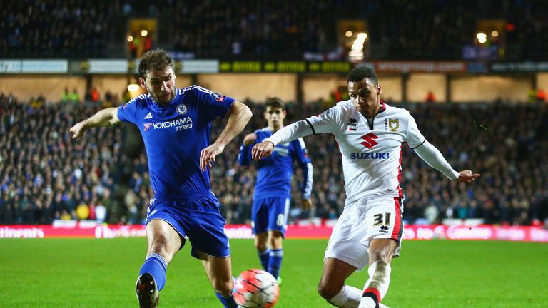 MILTON KEYNES, ENGLAND - JANUARY 31: Branislav Ivanovic of Chelsea challenges Josh Murphy of MK Dons during the Emirates FA Cup Fourth Round match between 