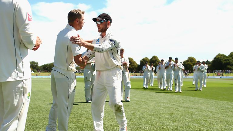 Brendon McCullum is congratulated by David Warner of Australia 