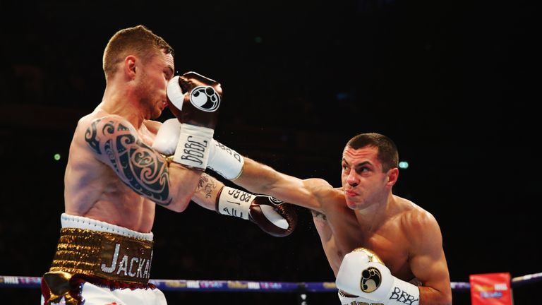 Scott Quigg (R) and Carl Frampton in action
