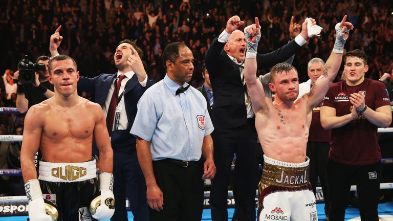 Carl Frampton (2R) celebrates a points victory over Scott Quigg (L)