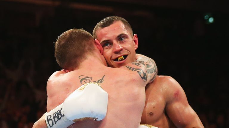 Carl Frampton and Scott Quigg (R) embrace