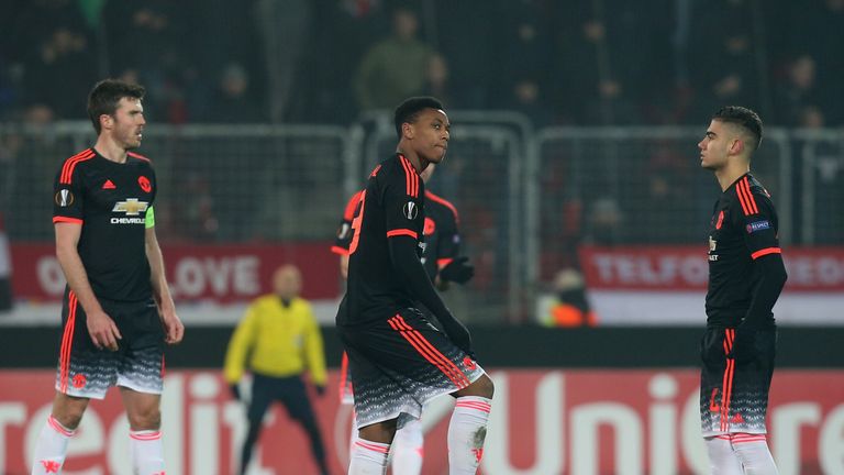 Michael Carrick, Anthony Martial and Andreas Pereira of Manchester United react to Paul Onuachu of FC Midtjylland scoring 