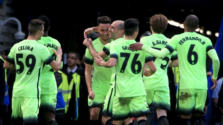 David Faupala celebrates Man City's first-half equaliser at Stamford Bridge
