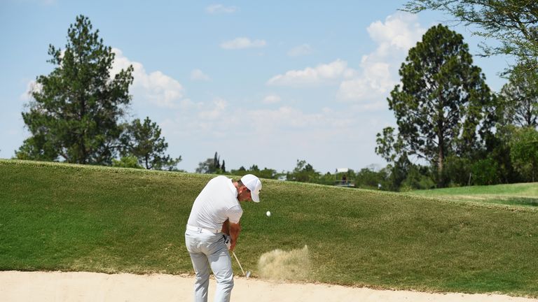 PRETORIA, SOUTH AFRICA - FEBRUARY 14:  Charl Schwartzel of South Africa plays from a bunker on the 10th hole during the final round of the Tshwane Open at 