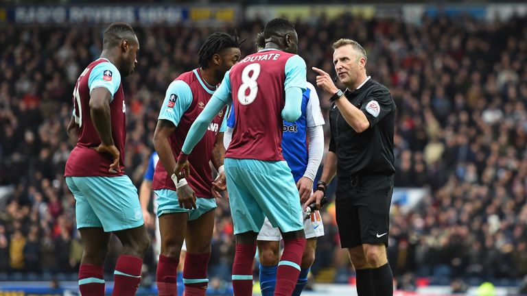 Cheikhou Kouyate is shown a straight red card by referee Jonathan Moss 