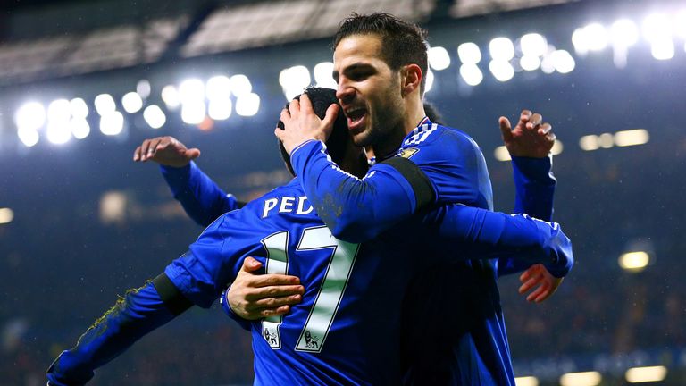 Cesc Fabregas celebrates with Chelsea team-mate Pedro at Stamford Bridge