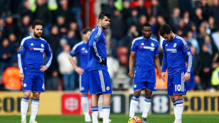Diego Costa (C), Eden Hazard (R) and Chelsea players react