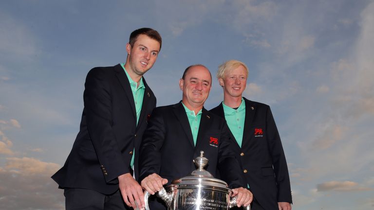 Ashley Chesters (L) Nigel Edwards (C) and Jimmy Mullen of The Great Britain and Ireland Walker Cup Team celebrate
