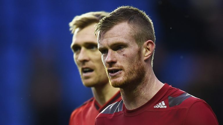 Chris Brunt of West Bromwich Albion leaves the field after being hit by an object during the Emirates FA Cup fifth round match at Reading