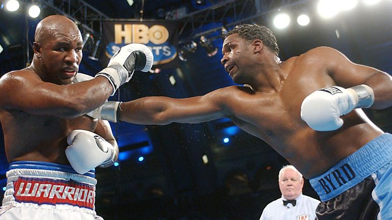 Chris Byrd (R) lands a punch on Evander Holyfield (L) during their IBF Heavyweight Championship bout 14 December, 2002 in At