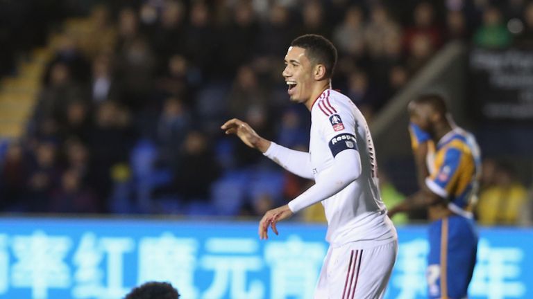 Chris Smalling of Manchester United celebrates scoring their first goal during the FA Cup Fifth Round match against Shrewsbury Town
