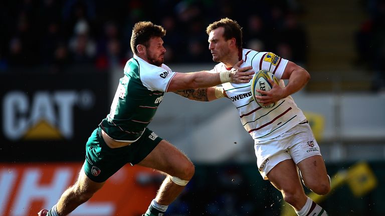 LEICESTER, ENGLAND - FEBRUARY 28:  Ciaran Hearn of London Irish is tackled by Adam Thompstone of Leicester during the Aviva Premiership match between Leice