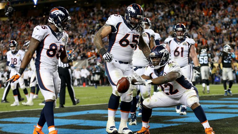  C.J. Anderson #22 of the Denver Broncos celebrates after scoring a 2-yard touchdown in the fourth quarter 
