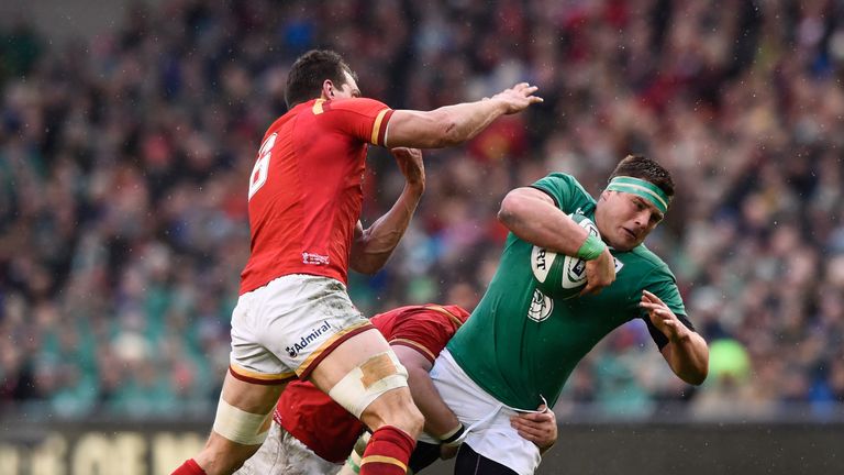 CJ Stander of Ireland is tackled by Sam Warburton of Wales during the RBS Six Nations match between Ireland and Wales