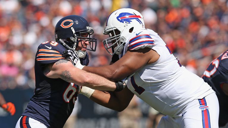 Jared Allen #69 of the Chicago Bears rushes against Cordy Glenn #77 of the Buffalo Bills